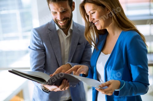 Preview: Young business people standing in the office