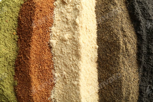 Preview: Different superfood powders as background, closeup view