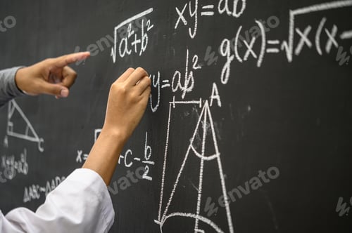 Preview: The hand that is written with the white chalk and the hand that shows the formula on the blackboard.