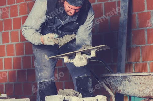 Preview: Real Construction Worker Bricklaying The Wall Using Tools.