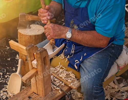 Preview: Hands of craftsman carpenter builds wooden tools.
