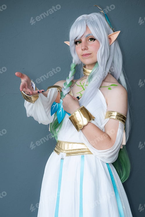 Preview: Caucasian female cosplayer dressed as an anime character in a white dress