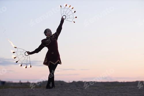 Preview: Female Fire Show Performer Wearing Costume Dancing