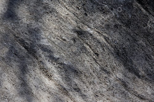 Preview: Texture Of A Large Rock With Shadows - Photograph Of The Details Of A Large Rock With The Sun