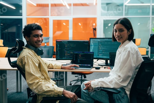 Preview: young programmers working on a new project for a start up business.