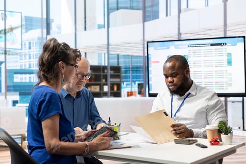 Preview: Mature couple receiving professional advice on retirement planning