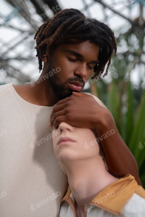 Preview: African American and Caucasian male models working together