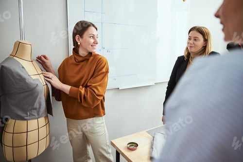 Preview: Inexperienced tailor looking for approval of teacher