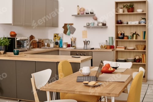 Preview: Opened Laptop on Kitchen Table