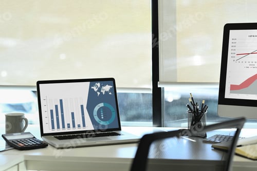 Preview: Laptop computer with statistics, marketing research results or statistics data on screen.