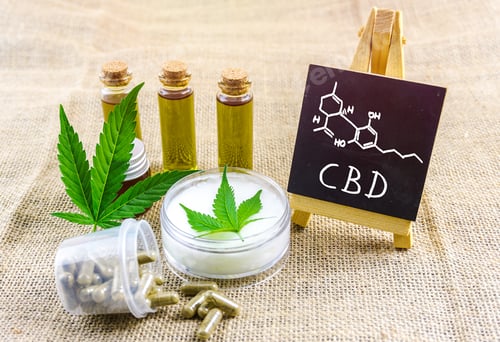 Preview: Cbd oils and topical cream and blackboard with chemical structure