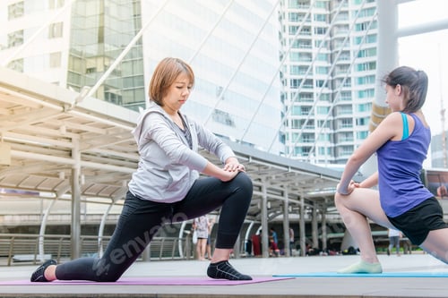 Preview: Sport Fitness Women running exercise in modern city wear wellness sportswear outside.
