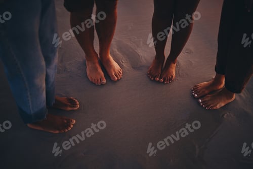 Preview: Friends, sand and feet at a beach at sunset, relax and bonding on summer vacation in nature. Toes,