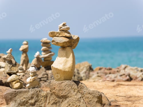 Preview: stacks of stones on the beach
