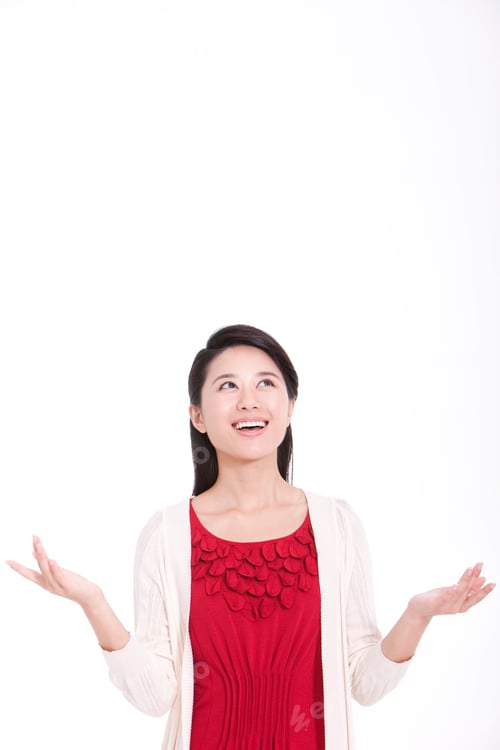 Preview: Young woman smiling with hand extension