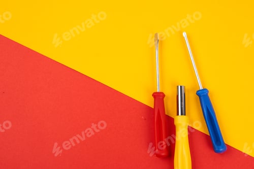 Preview: construction tools screwdrivers on double background repair equipment industry