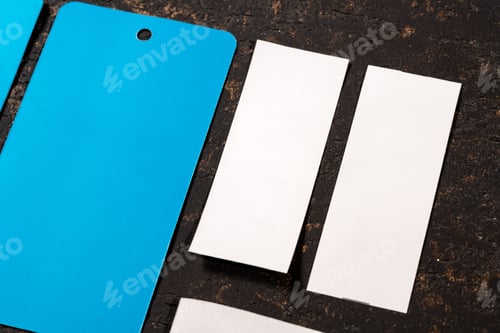 Preview: Closeup shot of blank blue and white paper tags for clothing sales