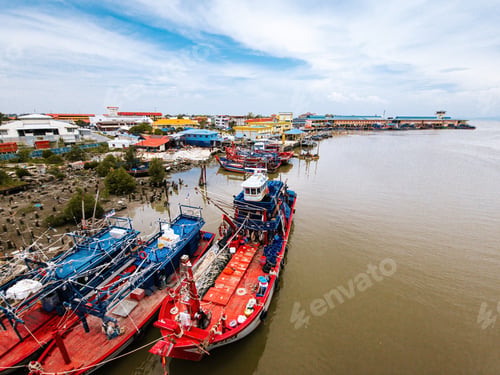 Preview: Perlis, Malaysia - Aug 6, 2022: Fishing village near the jetty in Kuala Perlis.