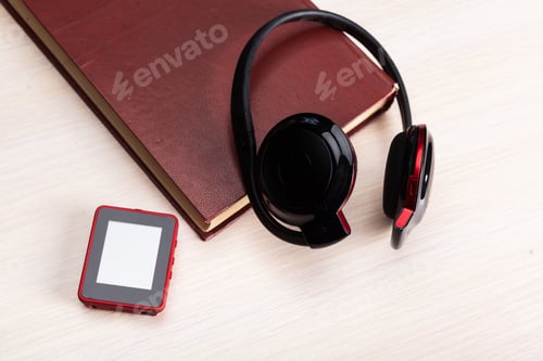 Preview: headphones on wooden background