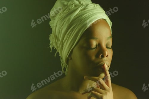 Preview: Portrait of Young Black Woman with Finger on Lips