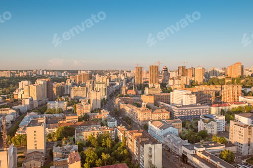 Preview: High view cityscape of Kyiv city in sunset light.