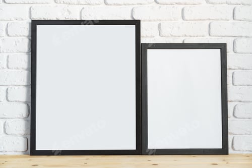 Preview: Photo frames on floor over white brick wall