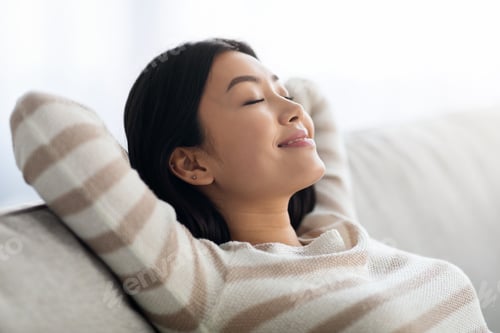 Preview: Home Relax. Portrait Of Calm Asian Woman Resting On Sofa With Closed Eyes