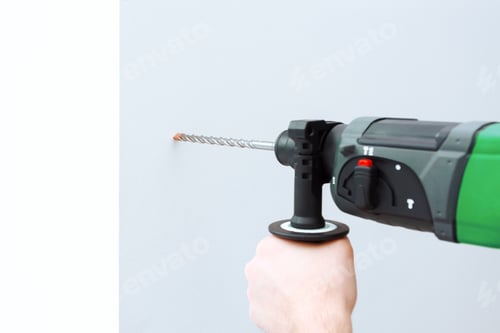 Preview: Use hammer drill to drill the wall