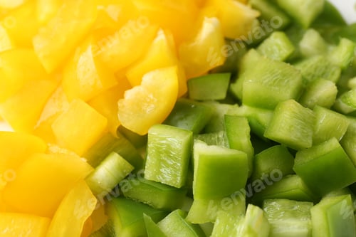 Preview: Pieces of fresh colorful bell peppers as background, closeup