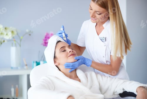 Adult Woman Receives Cosmetic Treatment in Medical Spa