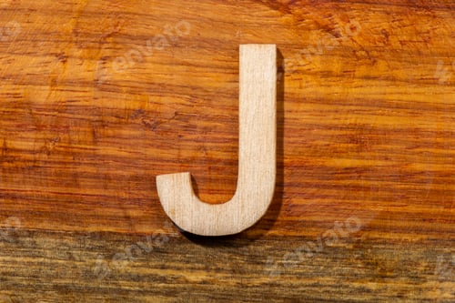 Preview: Wooden letters J on wooden background