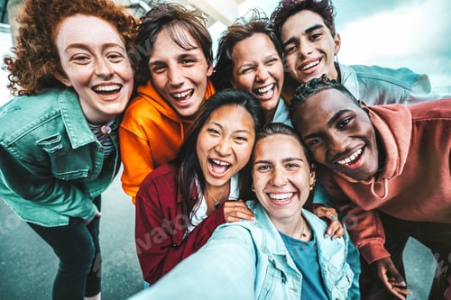 Preview: Multicultural best friends taking selfie pic with smart mobile phone outside