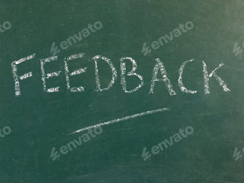 Preview: Feedback, word written in white chalk isolated on a green chalkboard