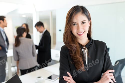 Preview: Business woman in conference room