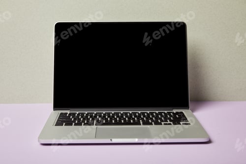 Preview: laptop with blank screen on purple and grey