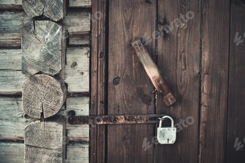 Preview: Locked old wooden door.