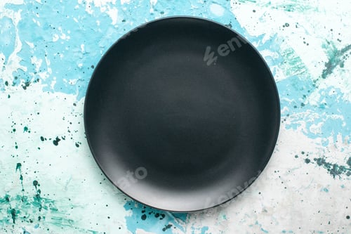 Preview: top view empty round plate dark colored on blue background color plate kitchen cutlery glass