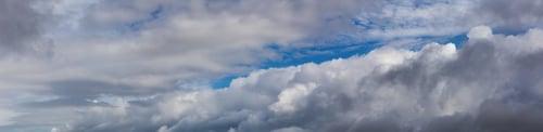 Preview: Panoramic View of Puffy Cloudscape during a colorful summer day