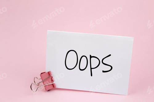 Preview: Note written on a white sticker with paper clip. Inscription oops