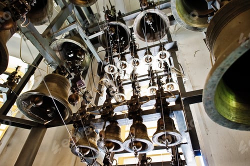 Preview: Close-up view of metal orthodox church bells in tower.