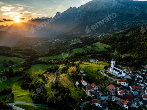 Preview: Picturesque aerial view of a village at sunset