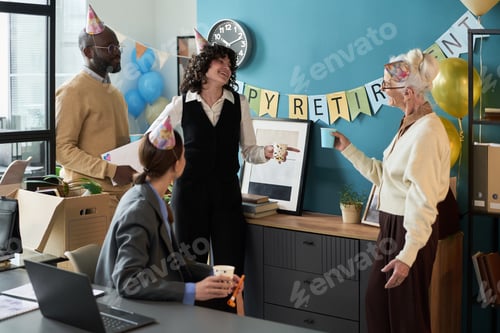Preview: Senior Caucasian Woman Celebrating Retirement with Diverse Coworkers in Studio