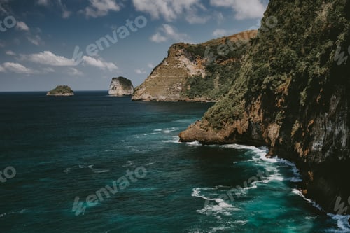 Preview: Ocean cliff shore timelapse aerial. Indonesia, Nusa Penida Island. Nobody nature scape at sea bay