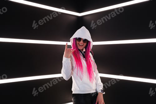 Preview: Woman with trendy pink afrocos in whitel ights.