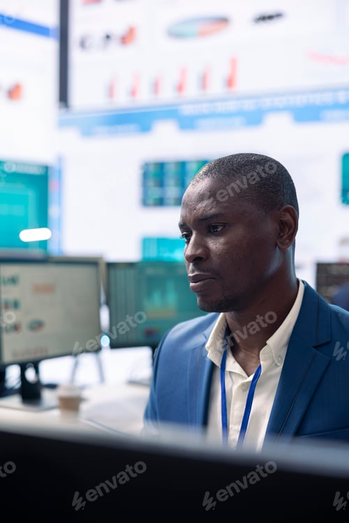 Preview: Company investor studying annual reports on a computer