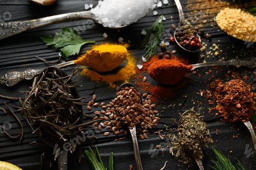 Preview: Colorful various herbs and spices for cooking on dark wooden rustic background