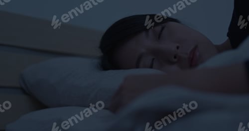 Preview: Woman sleep on bed