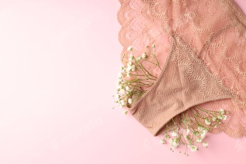 Preview: Concept of women's clothes with panties on pink background