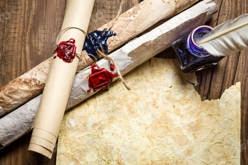 Preview: Old paper and scroll with the envelope symbol in sealing wax