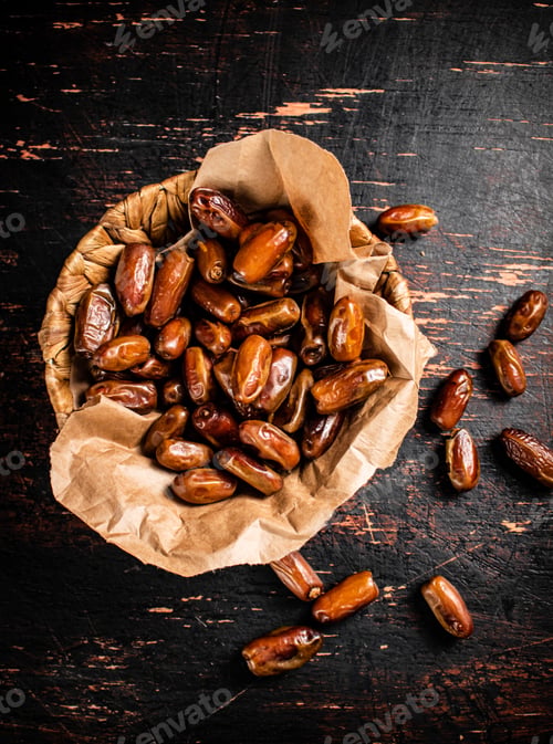 Preview: A pile of dates on paper on the table.